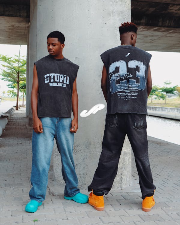 Two young men in graphic shirts — bold statement fashion 2026