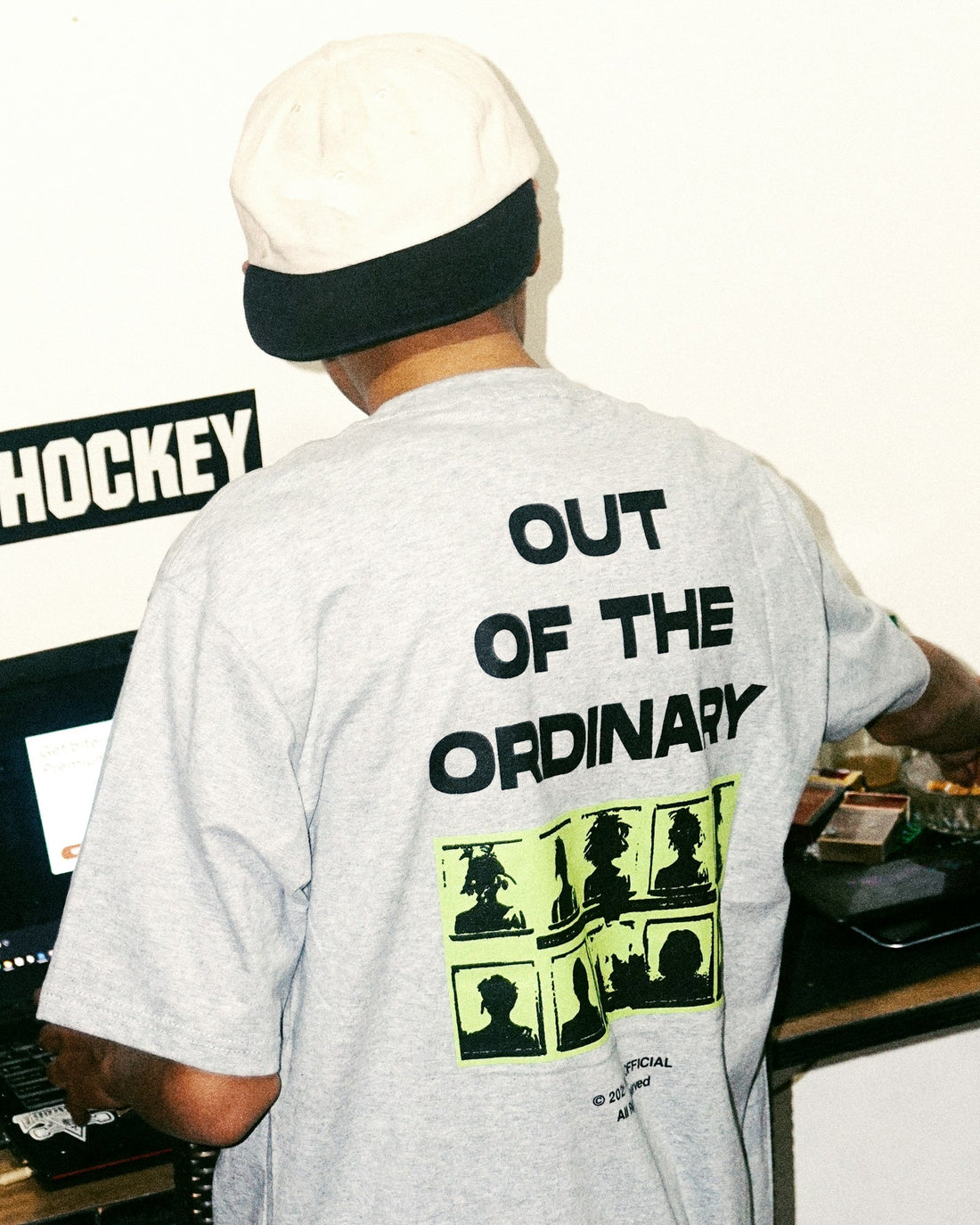 Man wearing a graphic t-shirt with a bold printed message