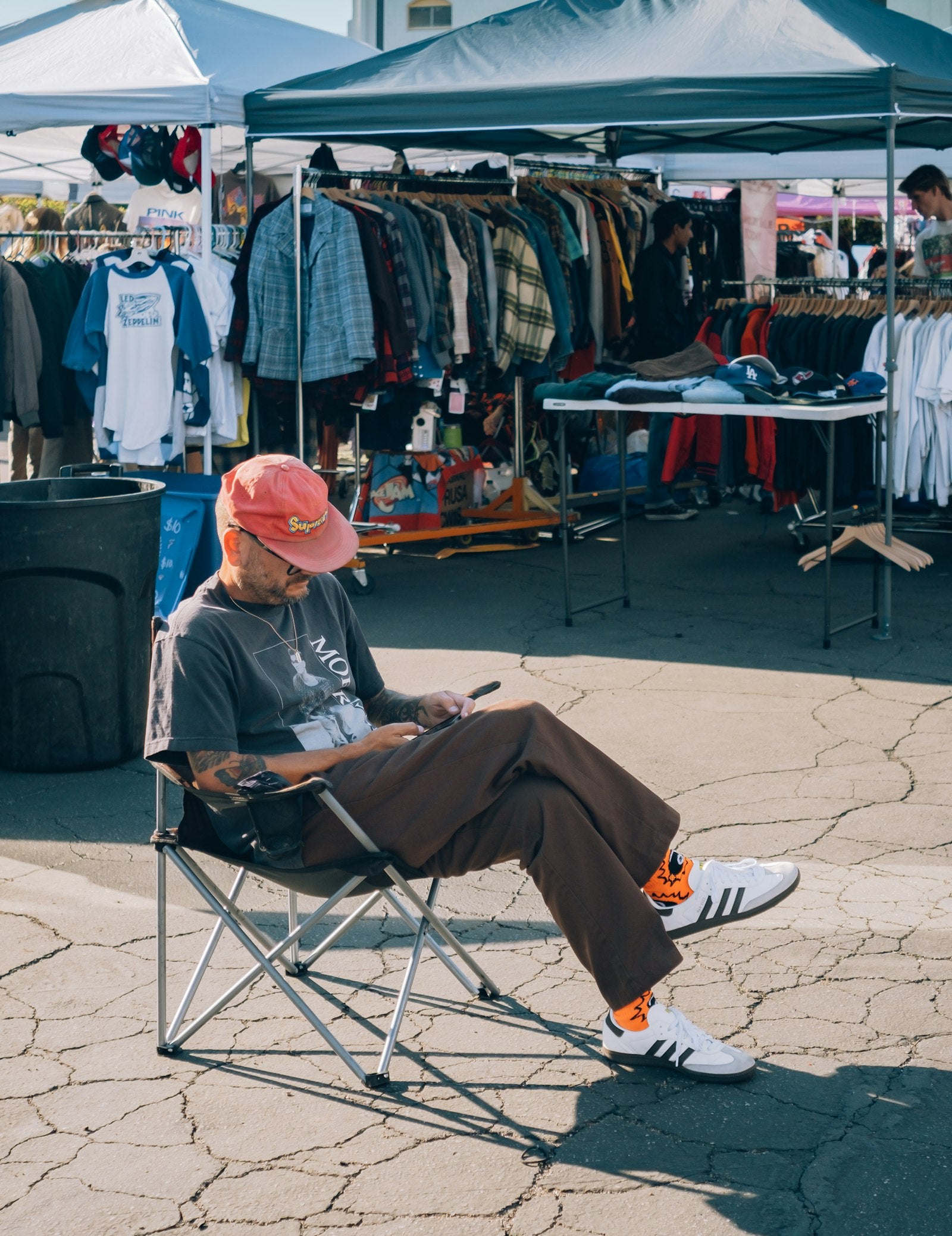 Man sitting relaxed in a chair outside